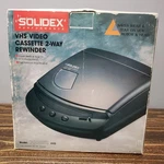 Solidex Video Cassette Vhs 2-WAY Rewinder Model 7000XT Box. Fixed Price $39.99.