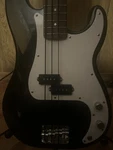 Squier Precision Bass Electric 4 String Solid Body Black Guitar W/ Amplifier. Fixed Price $249.00.