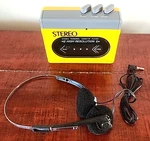 International Stereo Cassette Player Model AL-18 With Headset New. Fixed Price $19.99.