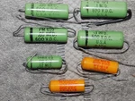 7 Vtg. Green Yellow Cornell Dubilier .015, .02, .05, .1, Mfd 600V Capacitors. Fixed Price $40.00.