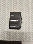 Sony Walkman WM-F2061 Cassette Tape Player Auto Reverse Radio Fm Am. Fixed Price $25.00.