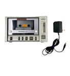 Technics RS-M1 Stereo Cassette Deck Condensed Into Hand-held Size Japan. Fixed Price $345.00.