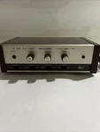 Vintage Realistic SA-100B Solid State Amplifier Japan Wood Grain Silver Face. Fixed Price $70.00.