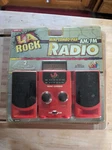 Dsi 45009 Red La Rock Radio Am/fm W/ 2 Removable Speakers Mini Combo-pak. Fixed Price $49.99.