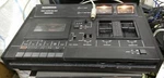 Roadstar RS-5700 Stereo Cassette Tape Deck, W/rec/pb Cable, Fits 220VAC/50HZ 11W. Fixed Price $479.00.