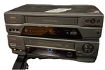 Vhs For Parts Symphonic SL2860 & Hitachi VT-MX4510A Eats Tapes/powers. Fixed Price $40.00.