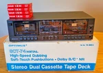 Realistic Optimus SCT-74 High Speed Dubbing Stereo Double Cassette Deck. Fixed Price $65.00.