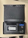 Sharp To Vhs-c VR-50CA Cassette Adapter With Protective Case. Fixed Price $31.00.