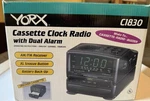 Yorx Cassette Clock Radio Model C1830, New In Opened Box 1994 Never Removed. Fixed Price $42.50.